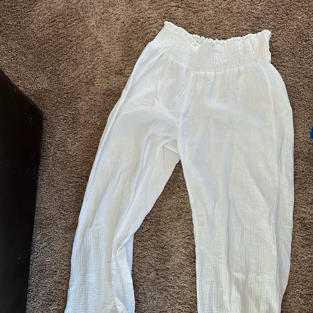 Flowing floor length white linen pants! Would work great as swimsuit cover up